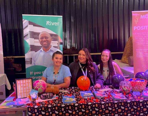 Workers at River pop up event